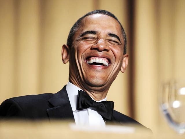 US president Barack Obama laughing at the annual dinner