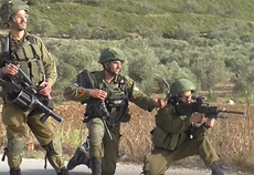 Israeli soldiers filmed cheering after shooting unarmed Palestinian