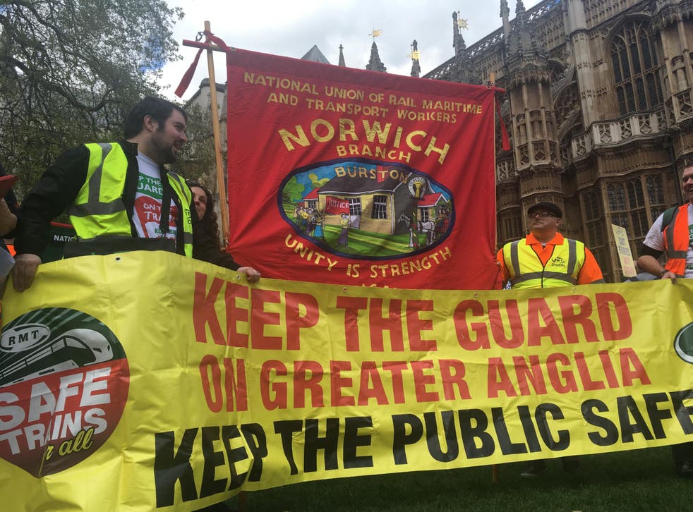 Strike call: Members of the RMT union who work for Greater Anglia demonstrating outside Parliament