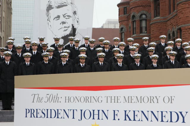 Members of the US Naval Academy mark the anniversary of John F Kennedy's assassination in Dallas, Texas
