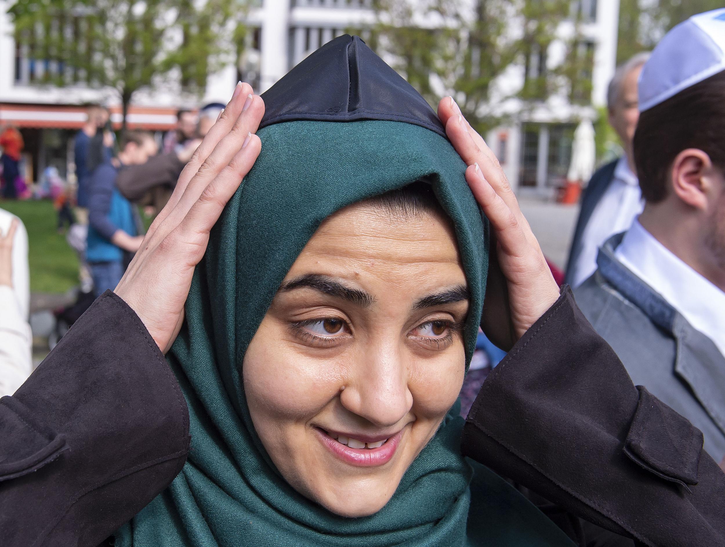 Iman Jamous wears the kippah during a demonstration against antisemitism in Erfurt, Germany