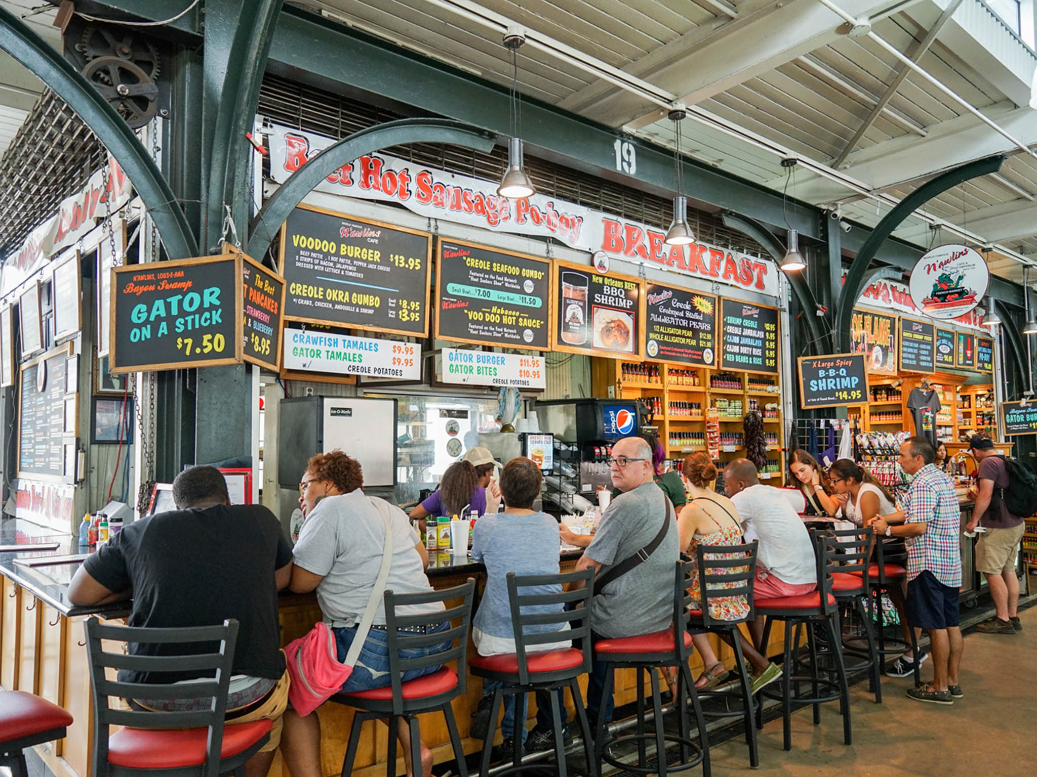 Sit up and eat: this French market stall, inside the French Quarter of the city is one of the best to try street food