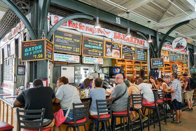 Sit up and eat: this French market stall, inside the French Quarter of the city is one of the best to try street food
