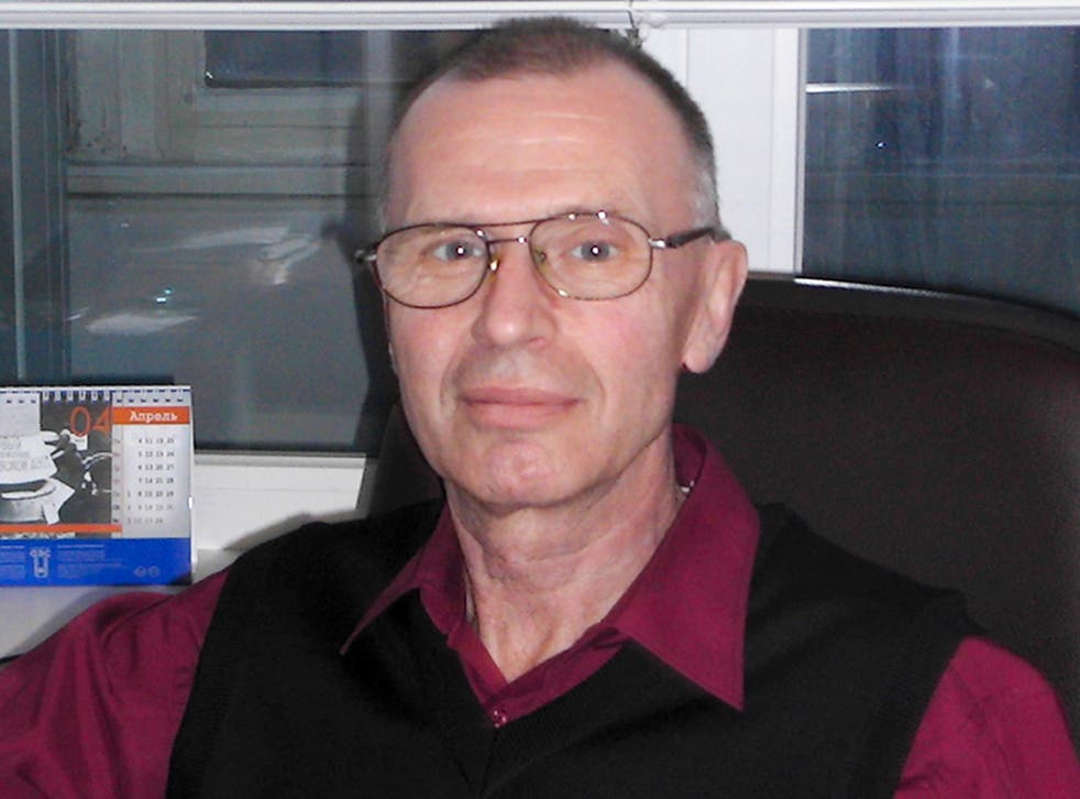 Russian chemical expert Vladimir Uglev poses for a photograph in 2011