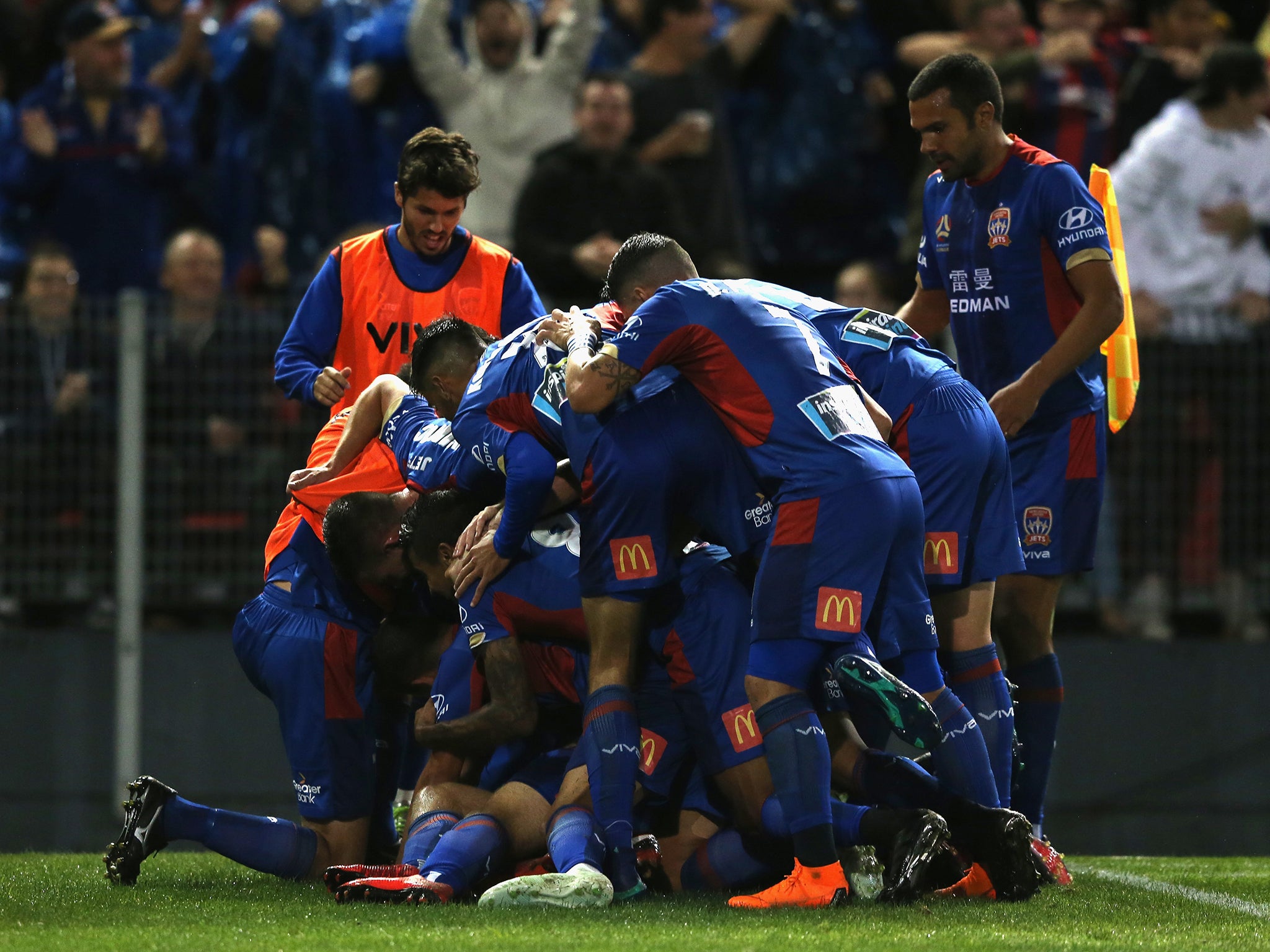 Riley McGree's scorpion kick sparked wild celebrations among the Newcastle Jets fans