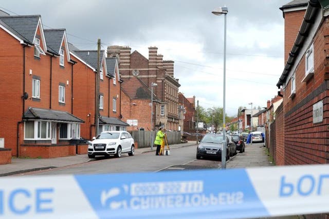 Police at the scene in Ettington Road in Aston, Birmingham on Friday after two men have been injured after they were hit by a car outside a mosque.