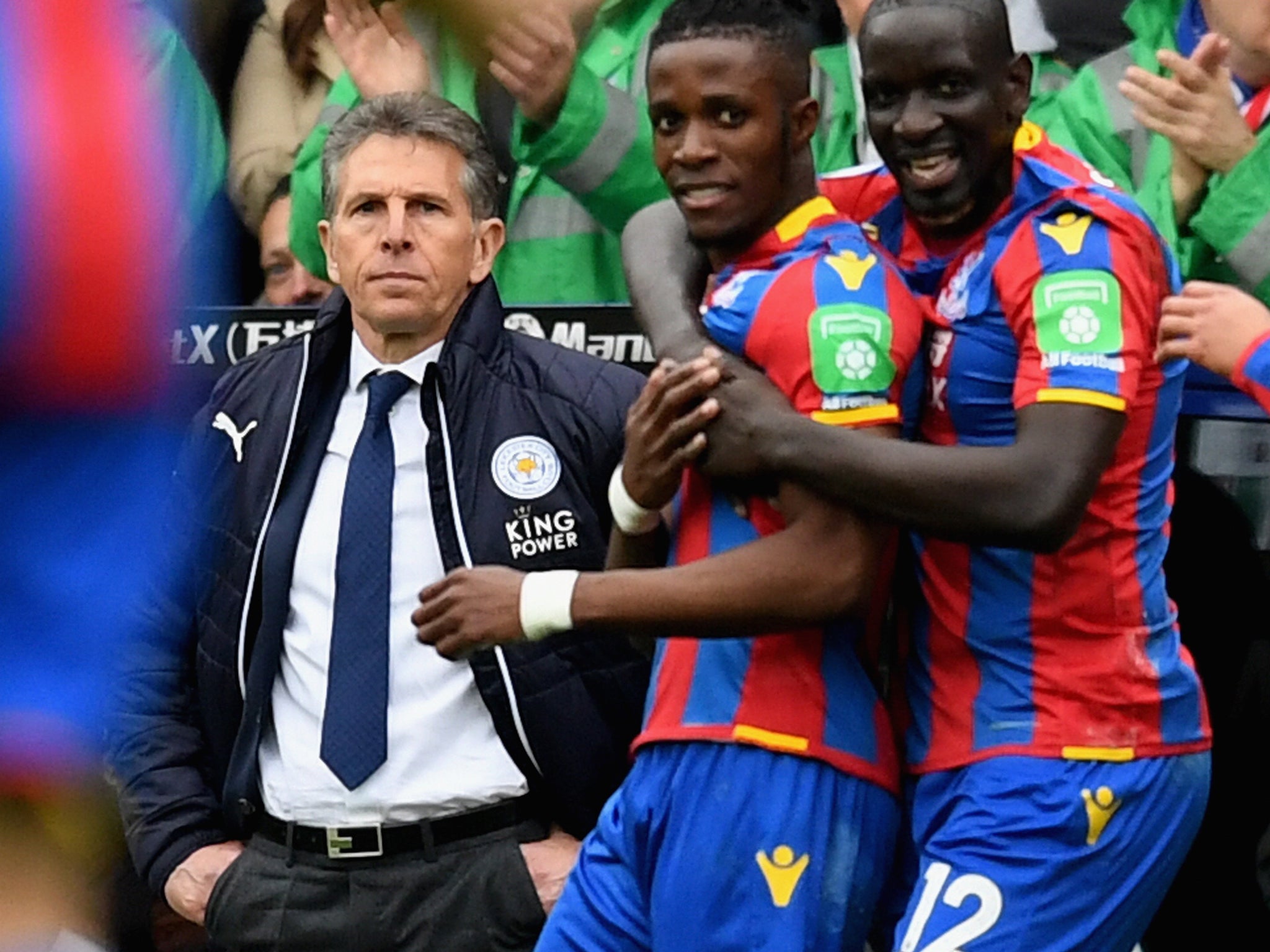 Claude Puel looks on glumly as Palace's players celebrate