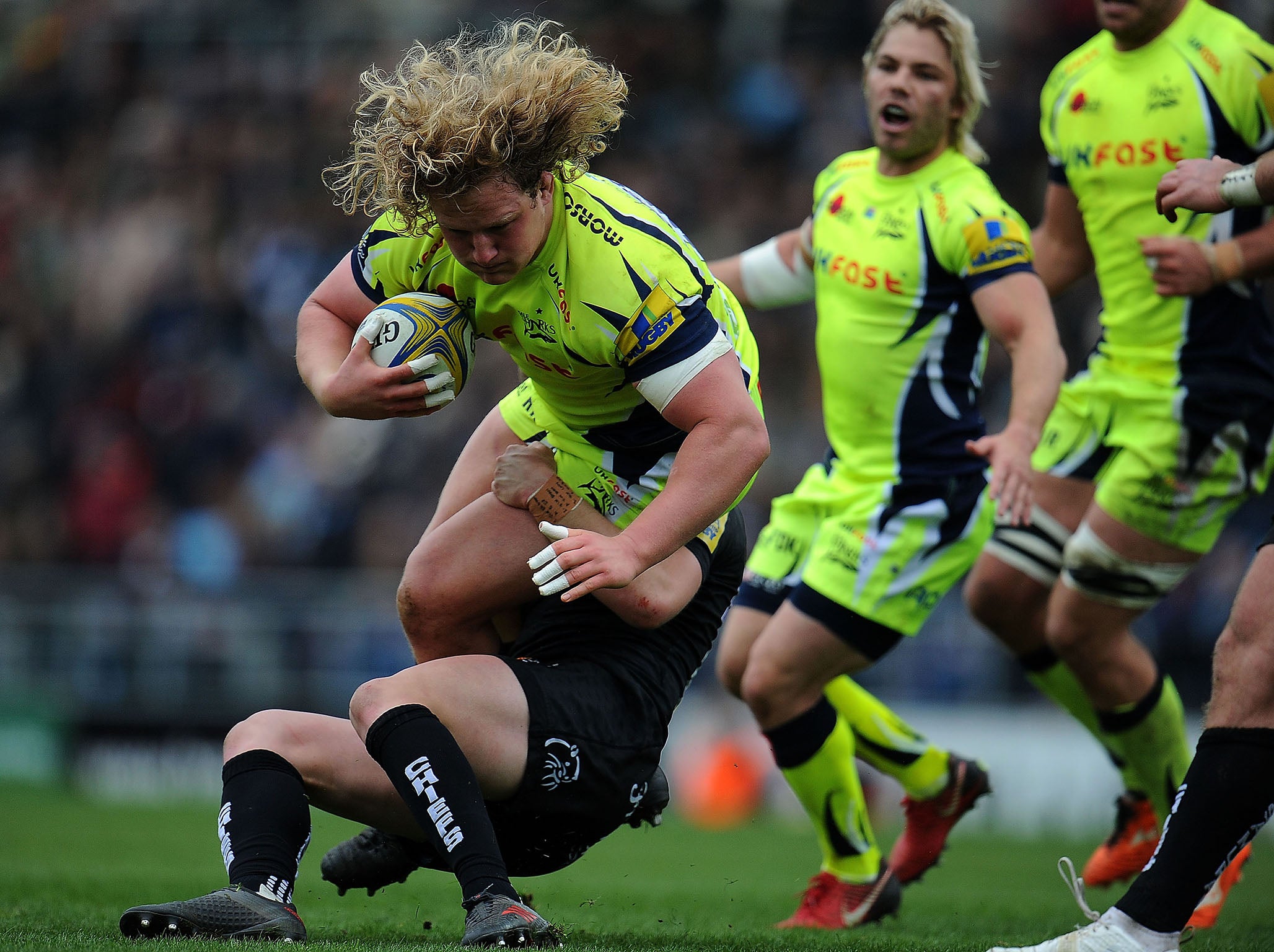 Sale’s Ross Harrison is tackled by Joe Simmonds
