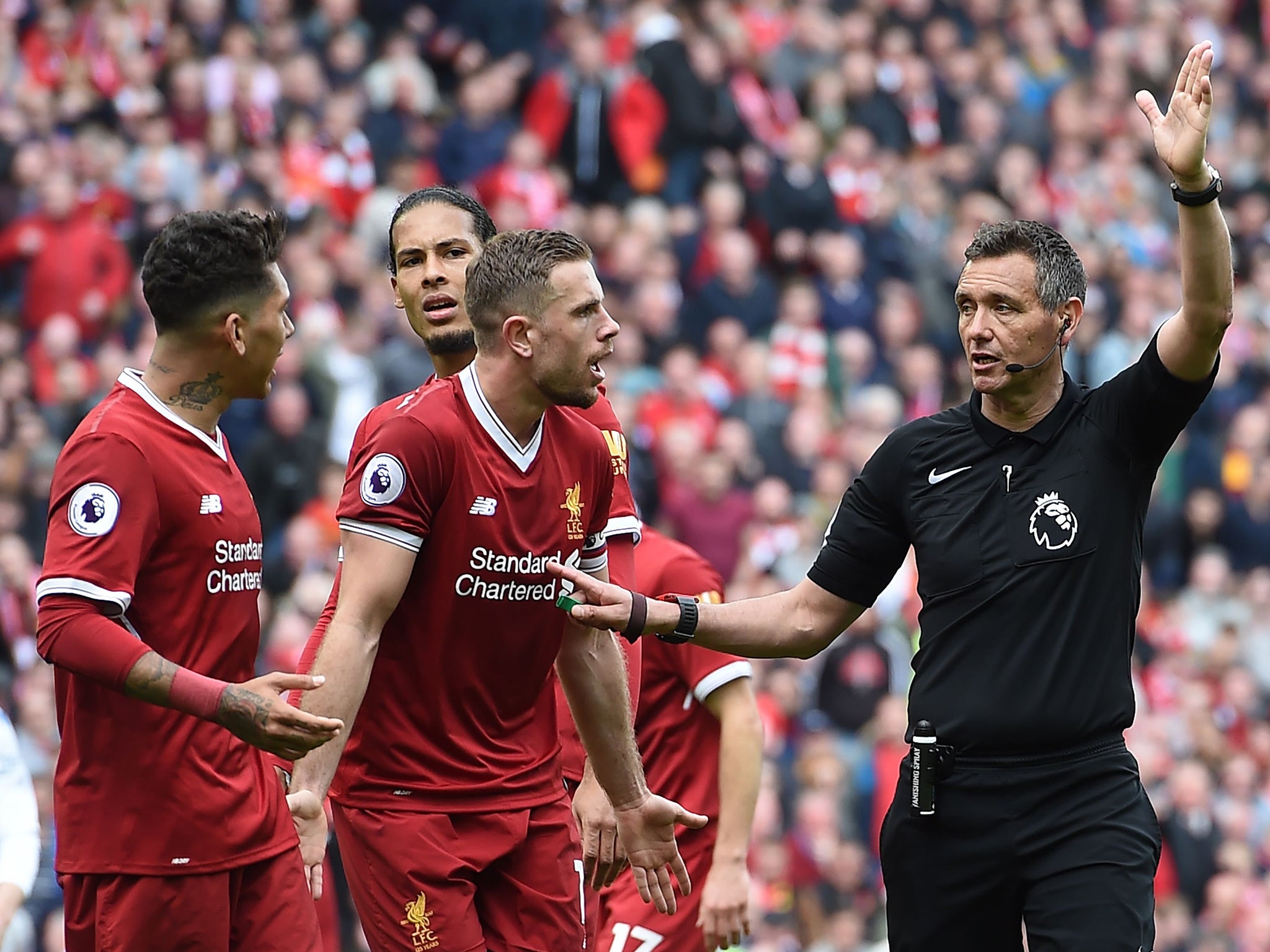 Jordan Henderson appeals unsuccessfully for a late penalty as Liverpool drew with Stoke