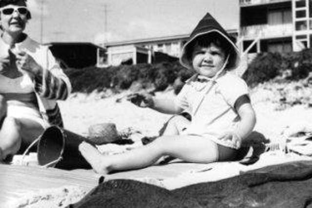 Lisa Morrow with her mother on an Australian beach in the Sixties