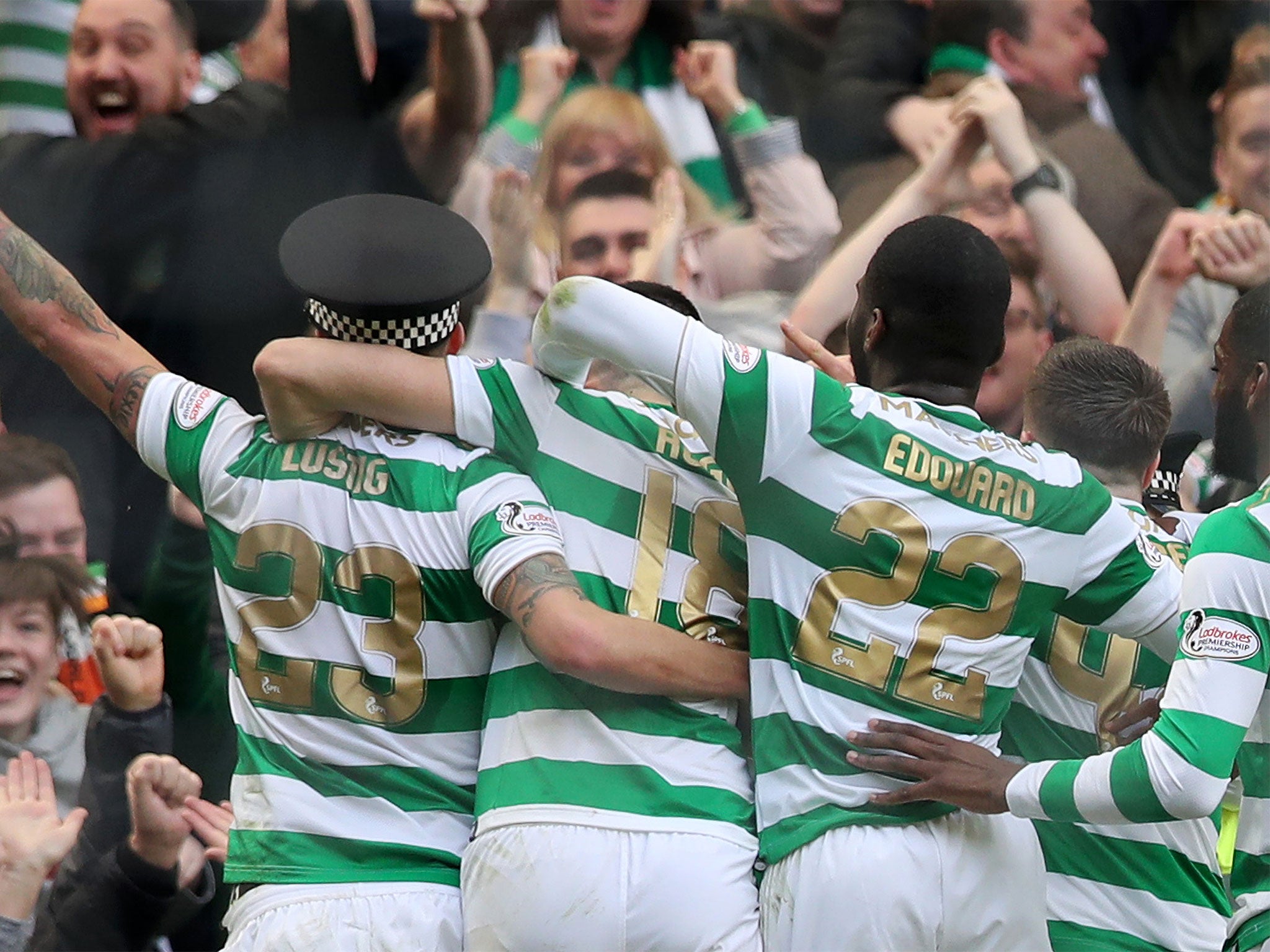 Celtic's players celebrate another goal and another title