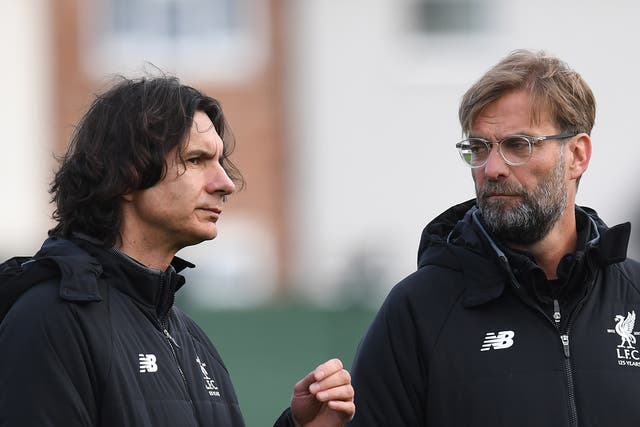 Zeljco Buvac (left), Jürgen Klopp's (right) assistant manager, has quit Liverpool