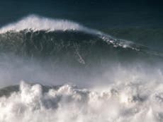 Surfer breaks world record after riding incredible 80-foot wave