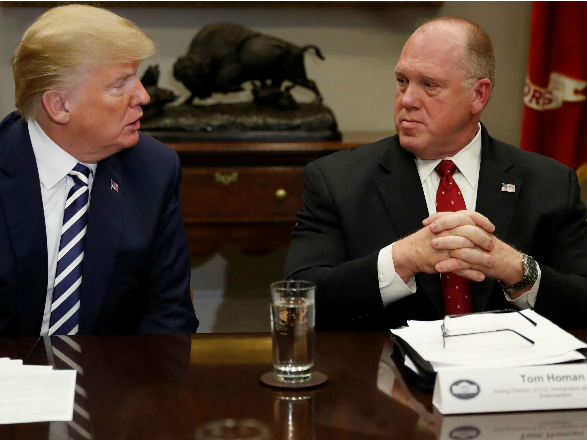 Donald Trump speaks to Thomas Homan during a round table meeting with members of law enforcement at the White House