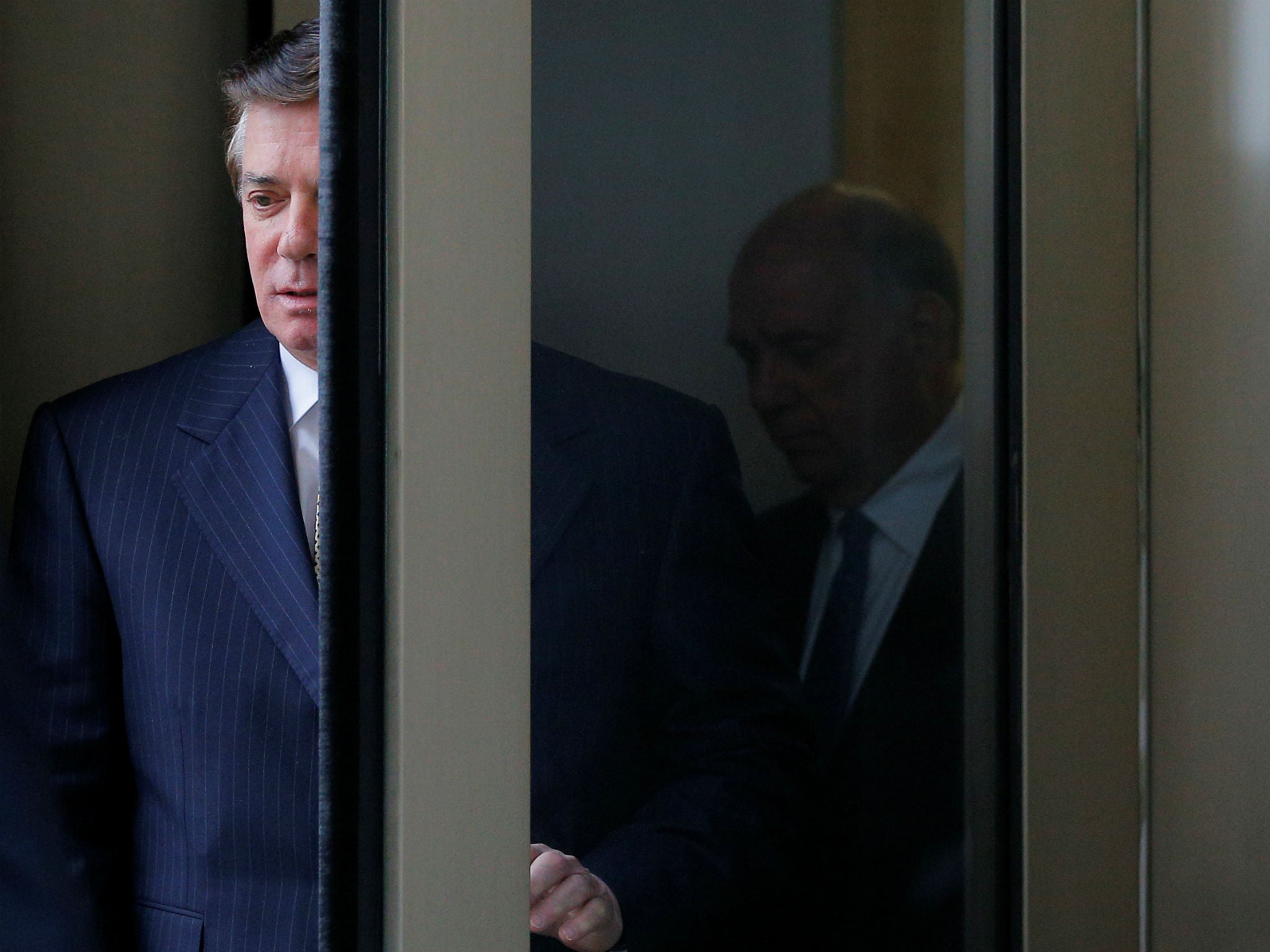 Paul Manafort departs after a hearing in Washington, DC
