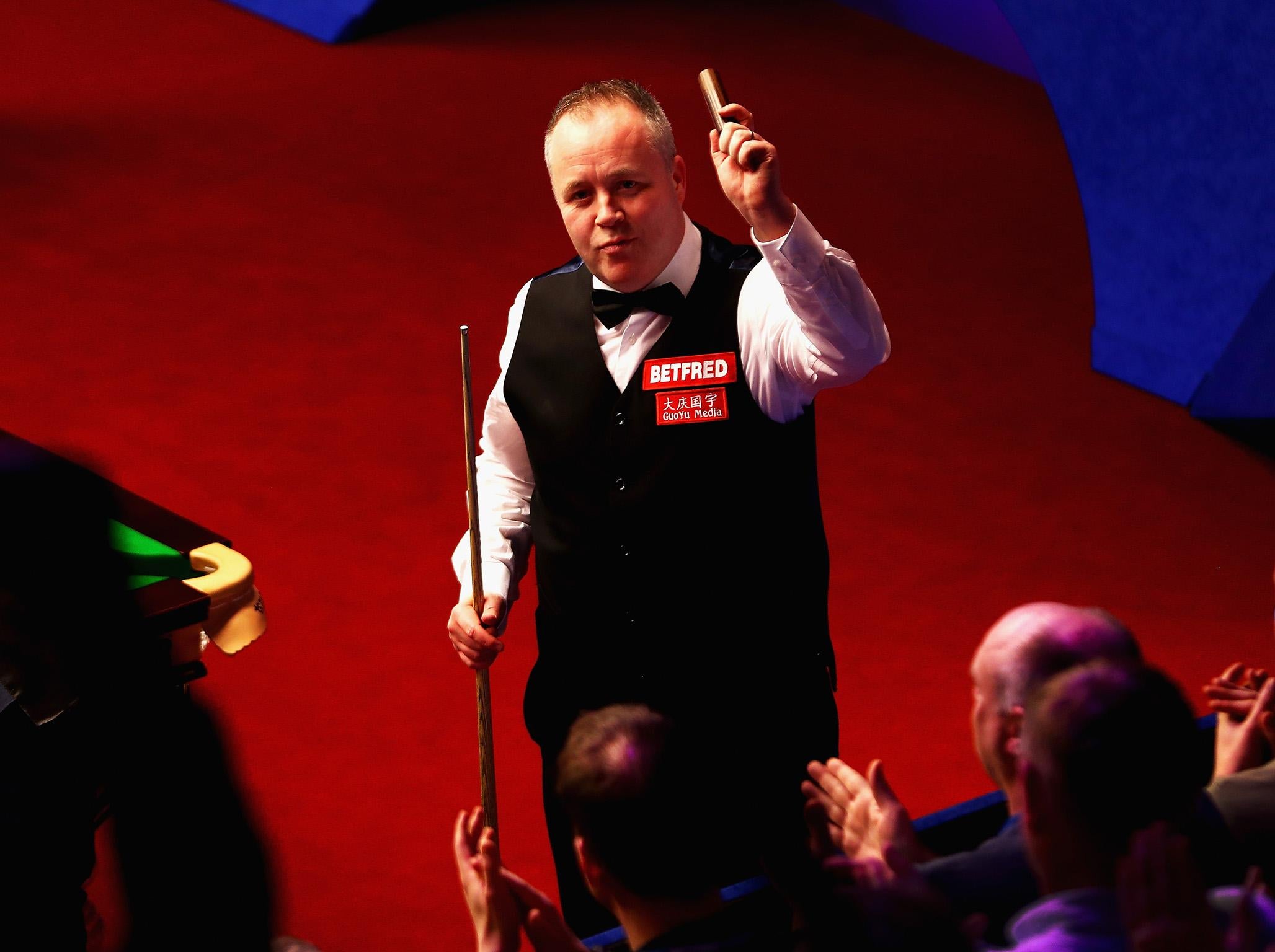 John Higgins edged out Judd Trump in the final frame