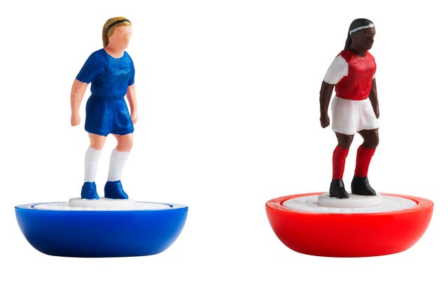 Figures in the colours of Chelsea and Arsenal from the first all-female Subbuteo set