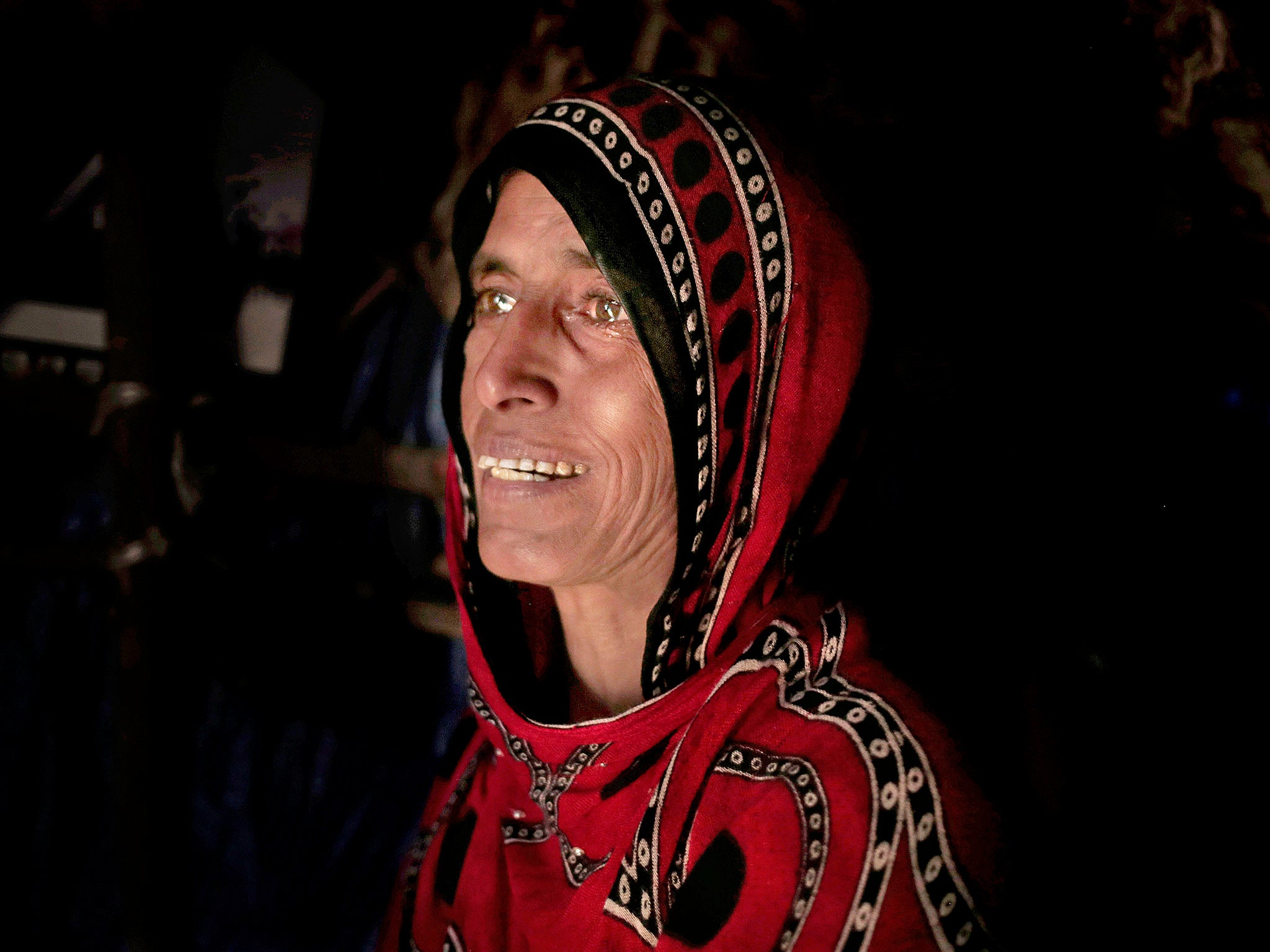 ‘I’ll go hungry for my children. I prefer that I don’t eat so they can,’ says Hagar Yahia, a mother of eight, in her hut in Abyan