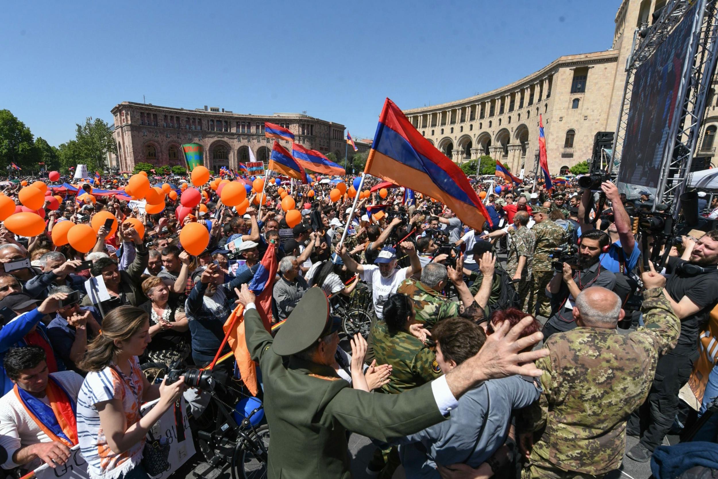 Supporters of protest leader Nikol Pashinyan attend a rally in downtown Yerevan on 1 May