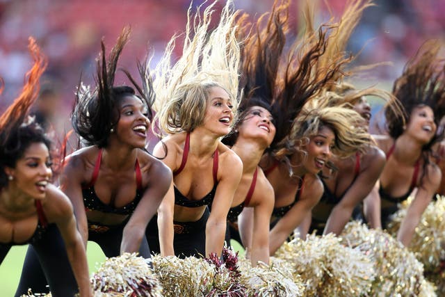 Washington Redskins cheerleaders dance during a stoppage in play as the Washington Redskins play the Cincinnati Bengals