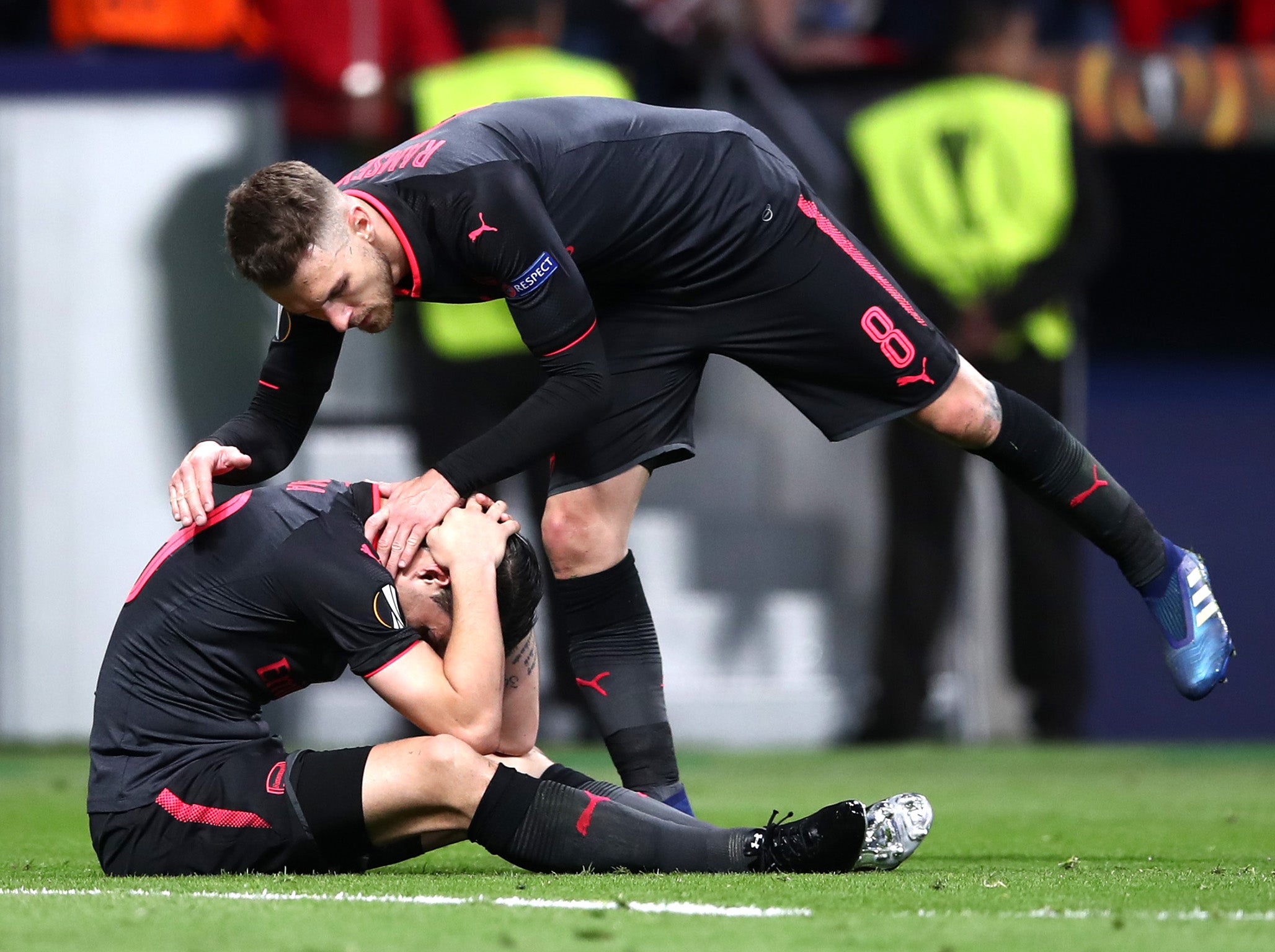 Aaron Ramsey commiserates Granit Xhaka