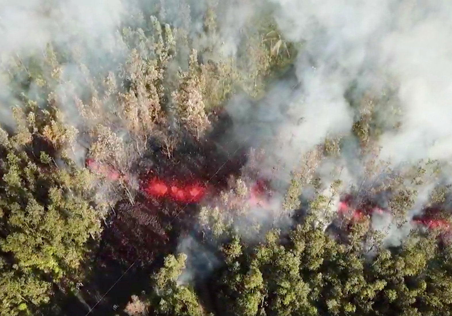 Up to 10,000 people were ordered to evacuate as flows of red lava entered residential areas