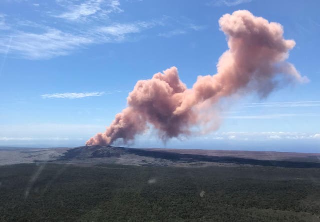 Plumes of ash rose above the Kilauea volcano on Thursday