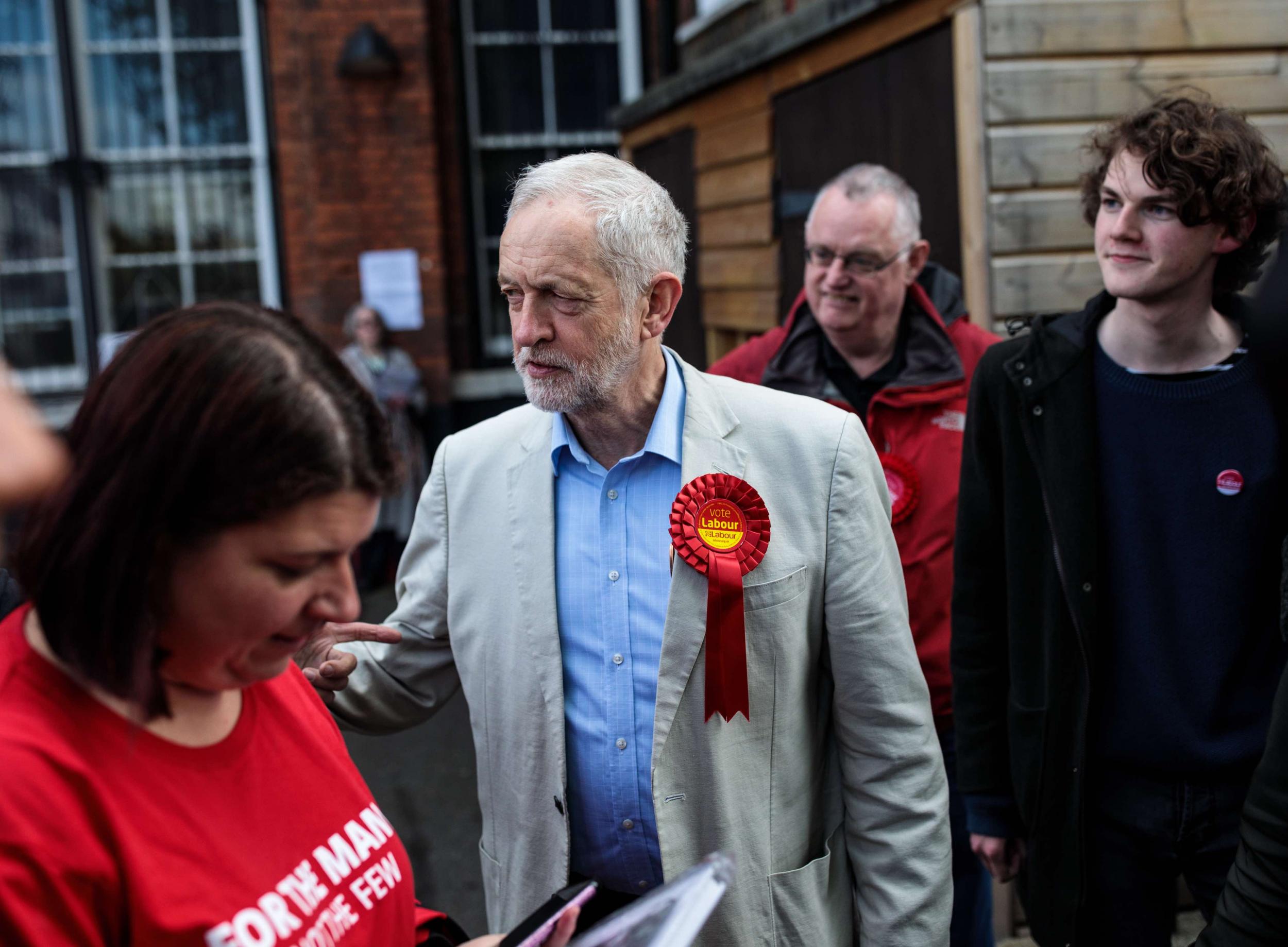 Jeremy Corbyn leaves after voting in local elections at a polling station in north London on 3 May