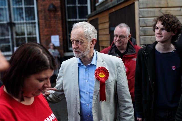 Jeremy Corbyn leaves after voting in local elections at a polling station in north London on 3 May