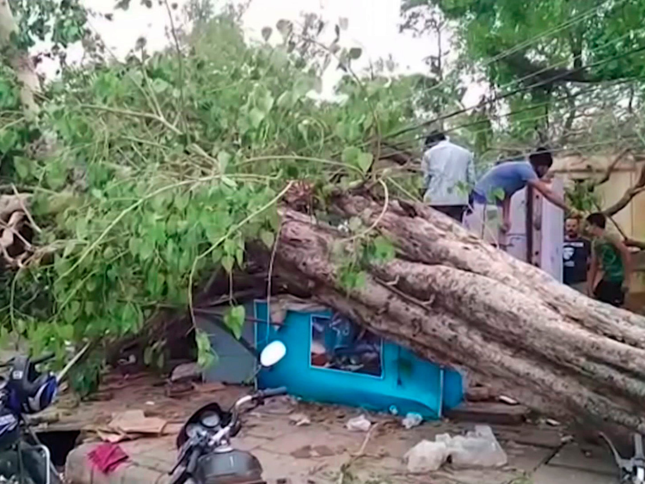 Frame grab from video provided by XYZ News shows damage caused by a rainstorm in the western Indian state of Rajasthan