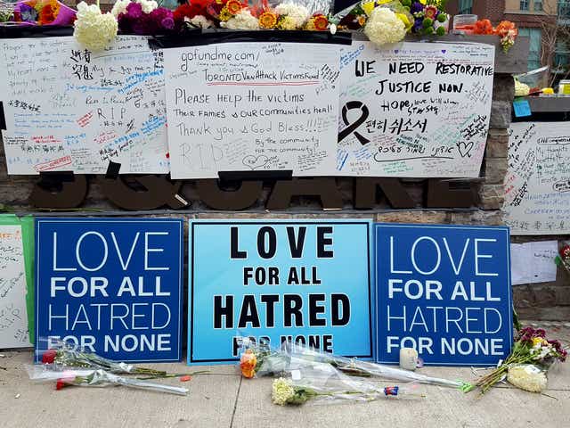 <p>Signs show support for victims of the 2018 Toronto van attack.</p>