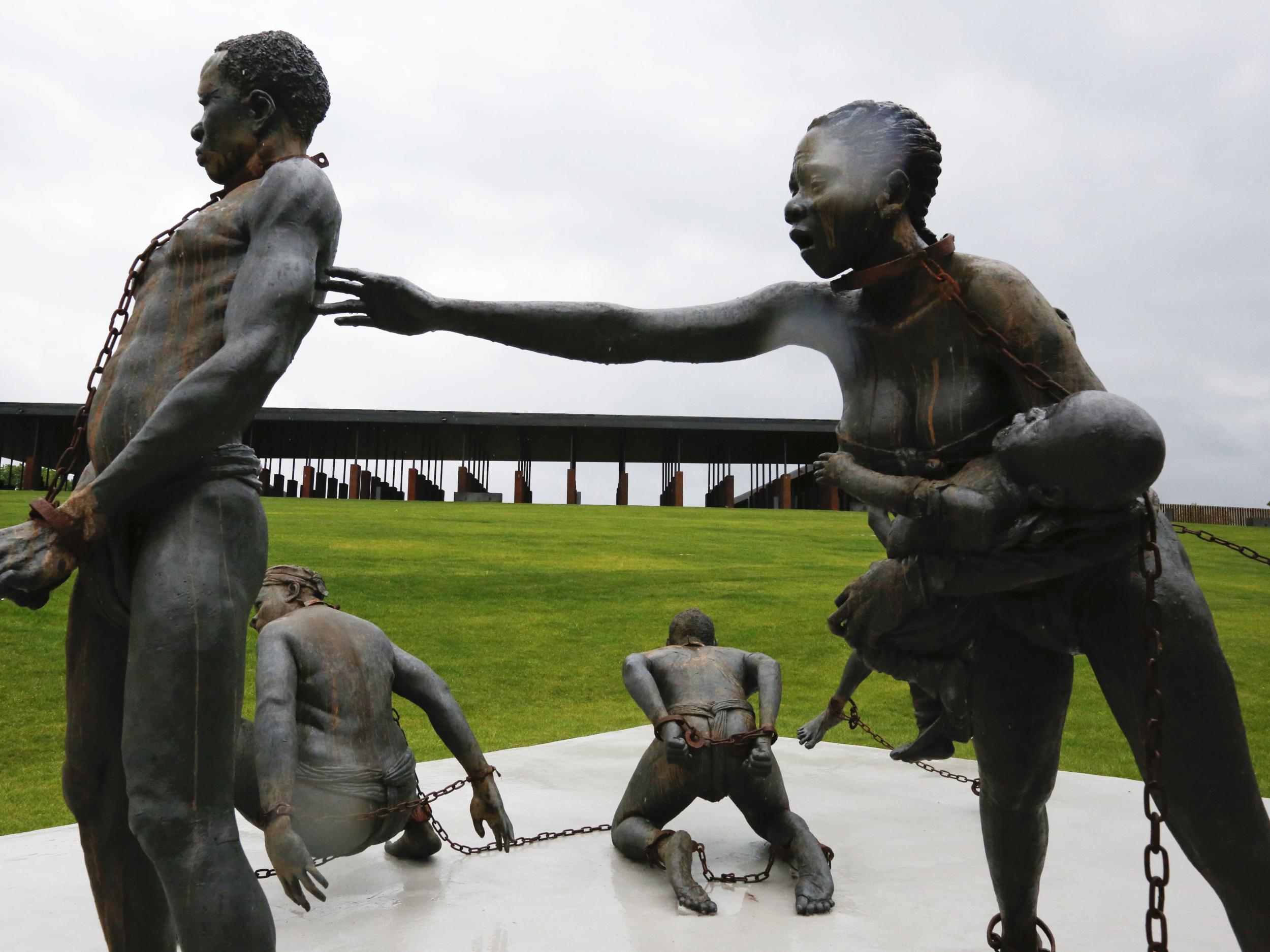 Kwame Akoto-Bamfo’s powerful sculpture at the National Memorial for Peace and Justice. Rust from the chains drips down the bodies of the enslaved figures