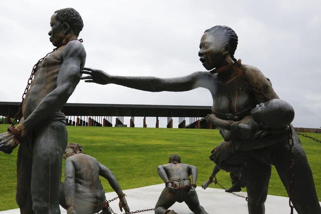 Kwame Akoto-Bamfo’s powerful sculpture at the National Memorial for Peace and Justice. Rust from the chains drips down the bodies of the enslaved figures