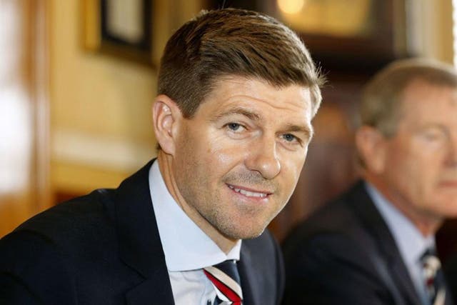 Steven Gerrard shakes hands with Rangers chairman Dave King