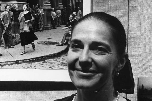 Ninalee Craig in front of Ruth Orkin’s famous image the American Girl in Italy