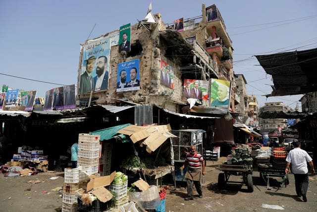 Election posters cover buildings and walls in Tripoli’s Bab al-Tabbaneh neighbourhood