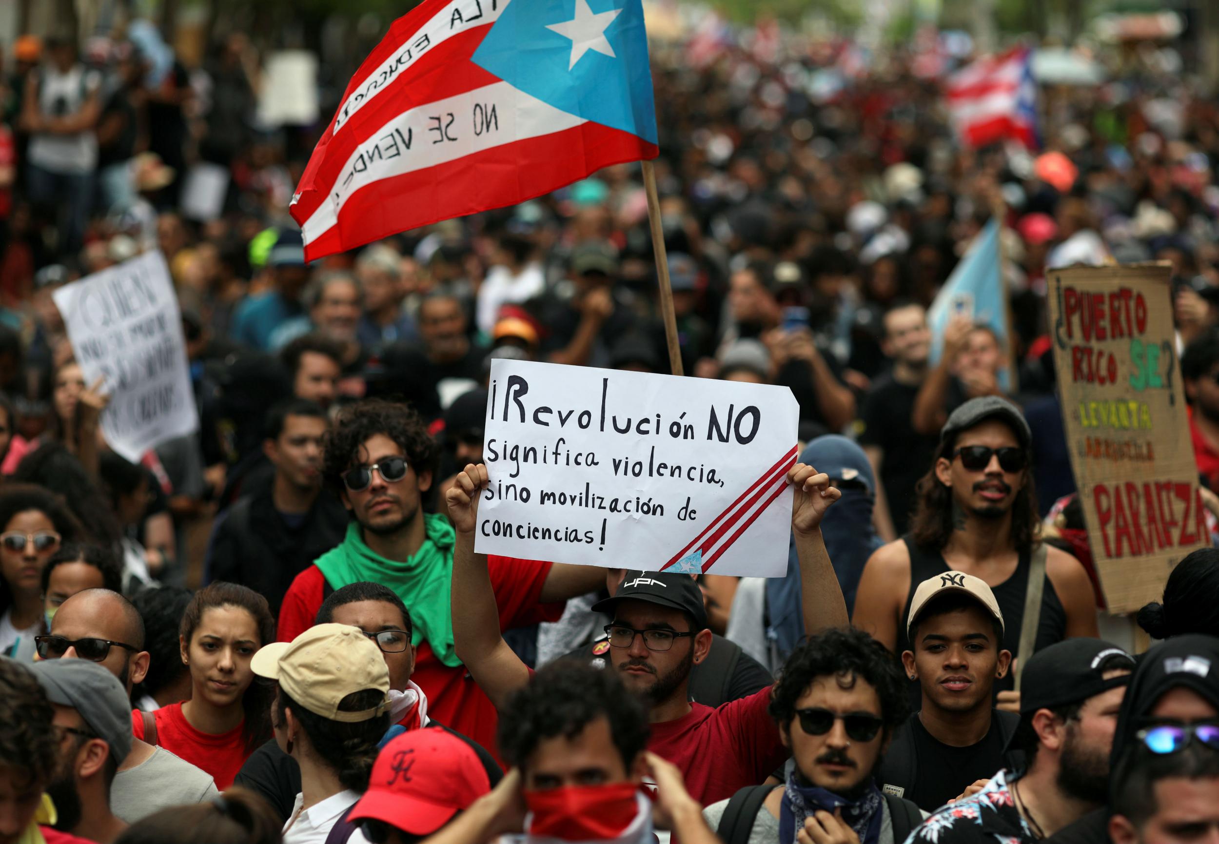 Marchers in San Juan on May Day last week protest austerity measures imposed by the federal fiscal board
