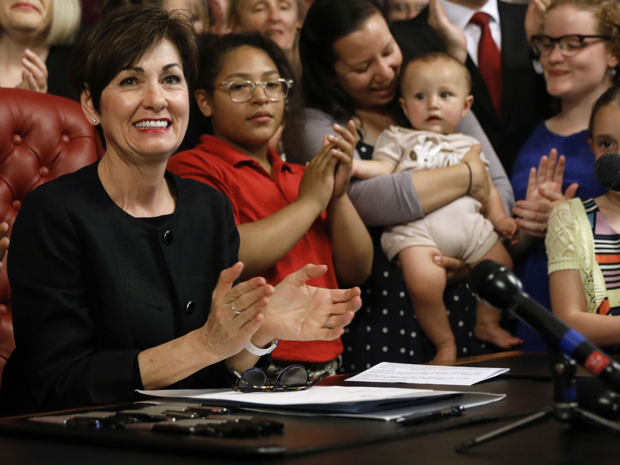 Iowa Governor Kim Reynolds said her signing the bill was 'bigger than just a law'