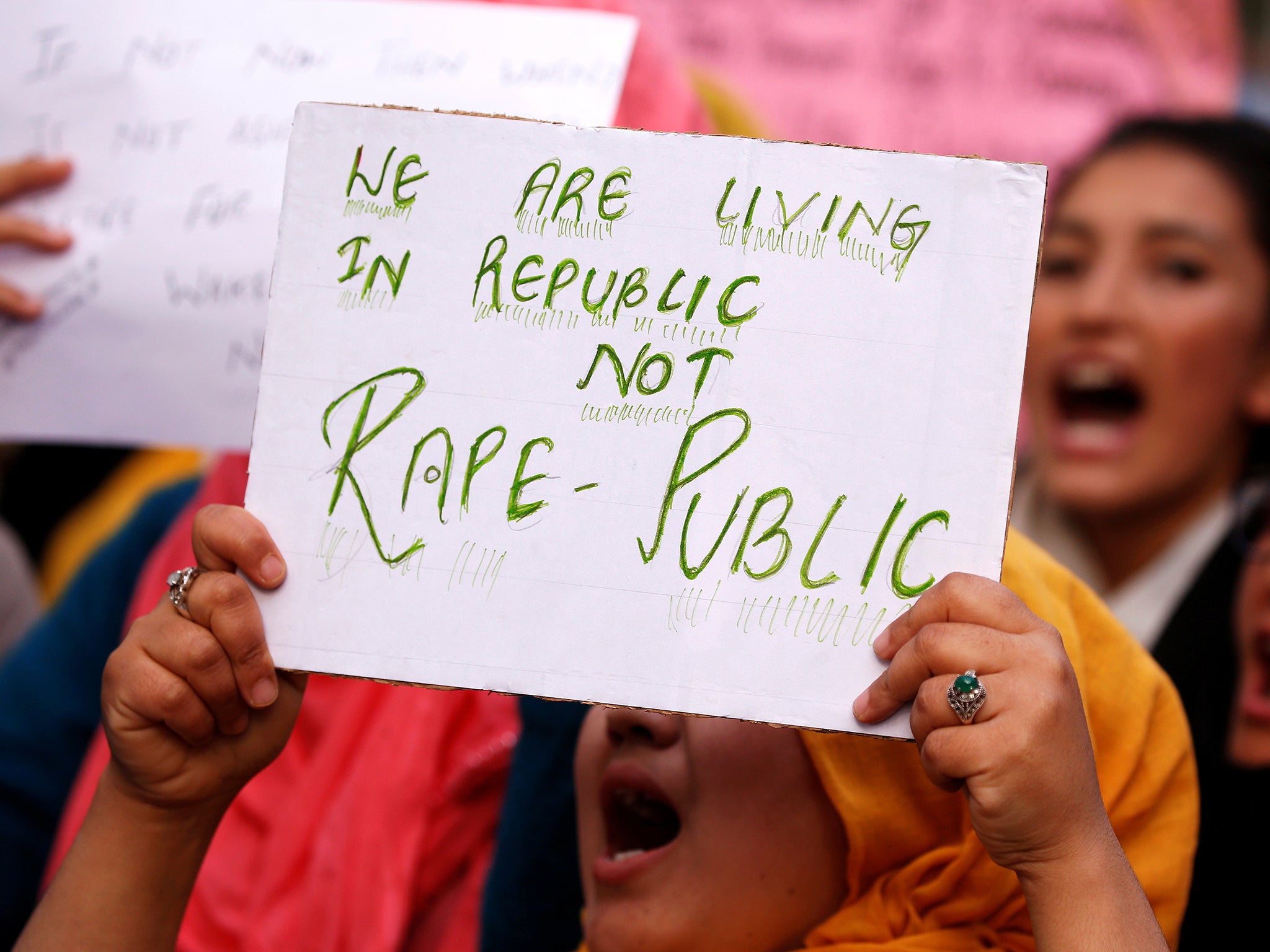 Students shout slogans during a protest against the rape and murder of an eight-year-old girl in Kathua near Jammu, in Srinagar, last month