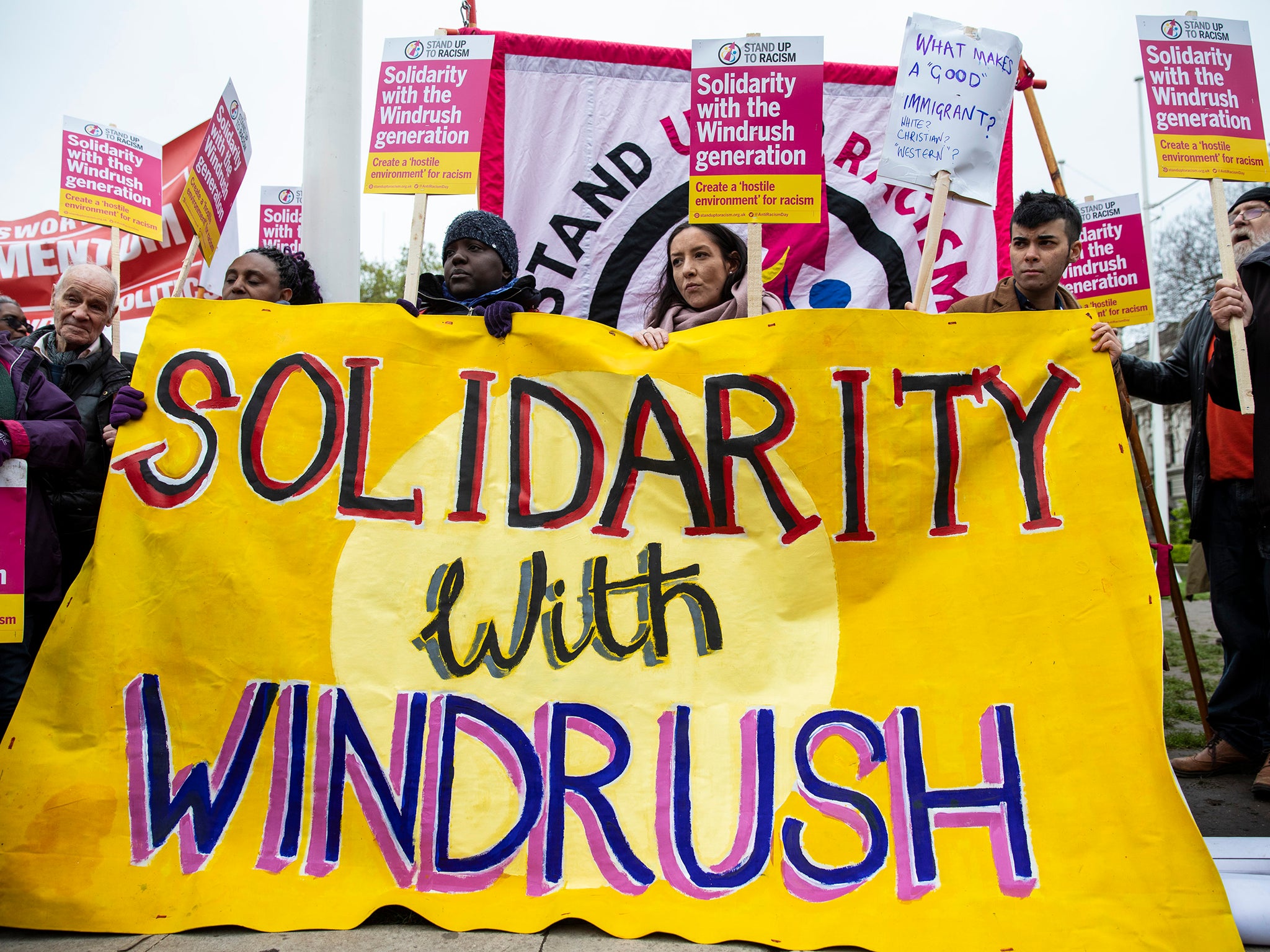 Protesters gather in Parliament Square to demonstrate about the ongoing Windrush migrant scandal