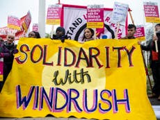 Windrush protesters urge May to quit over ‘hostile environment’