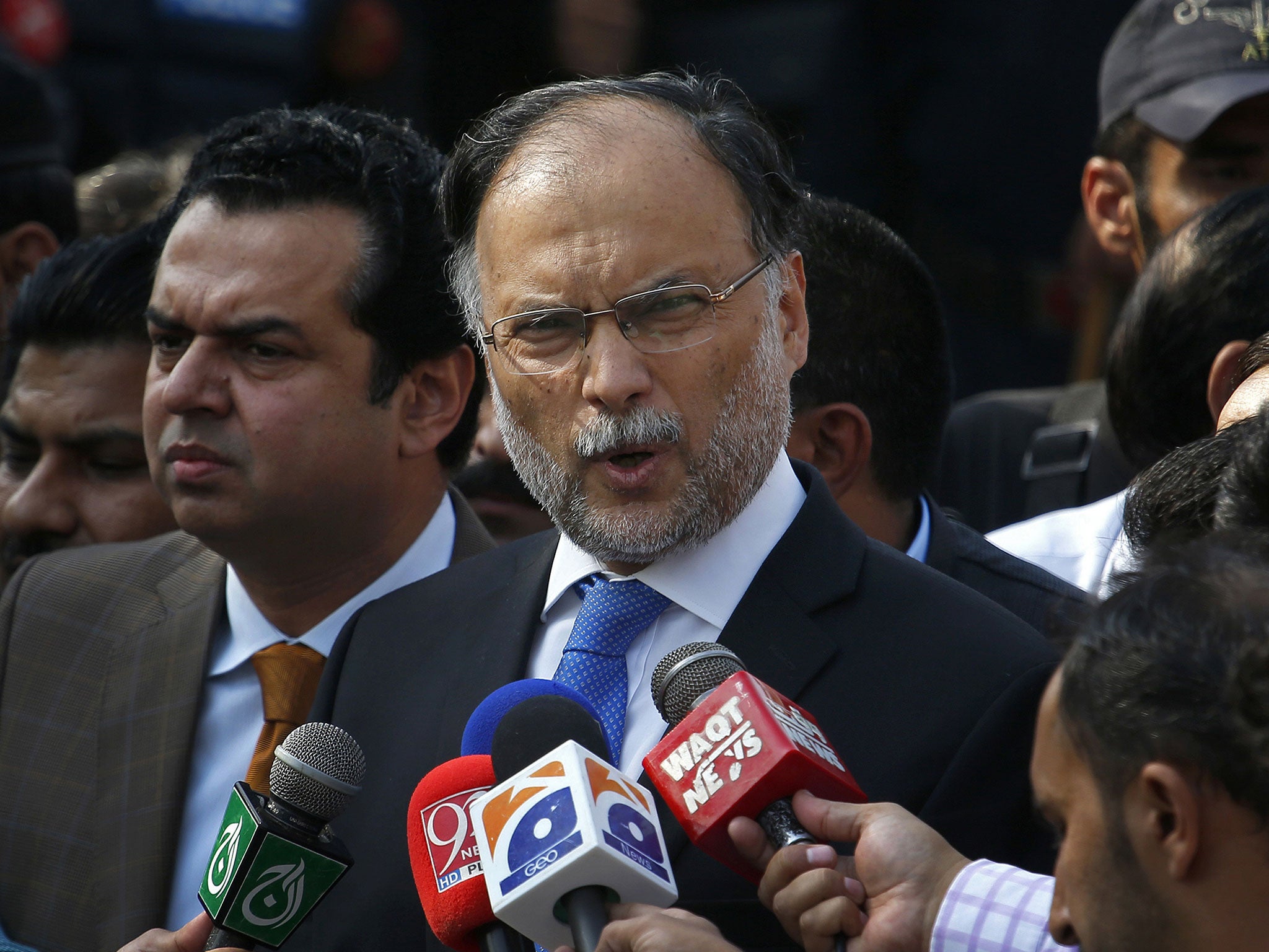Ahsan Iqbal was shot in the shoulder during an election rally in central Punjab province