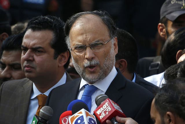 Ahsan Iqbal was shot in the shoulder during an election rally in central Punjab province