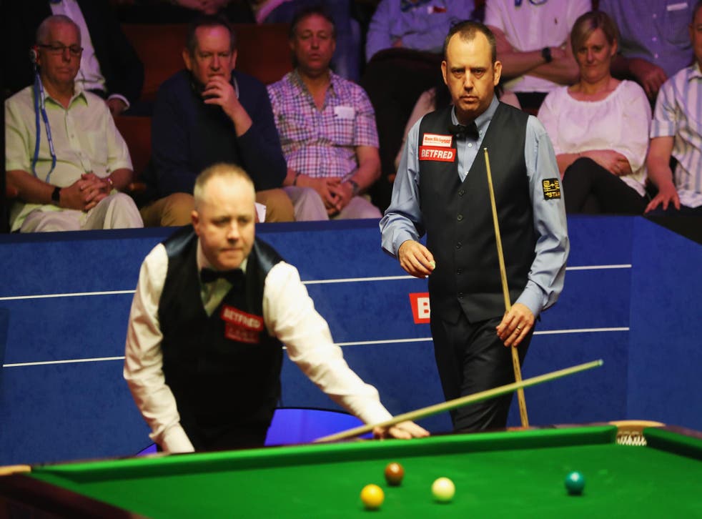 Mark Williams, right, leads the way against old friend John Higgins