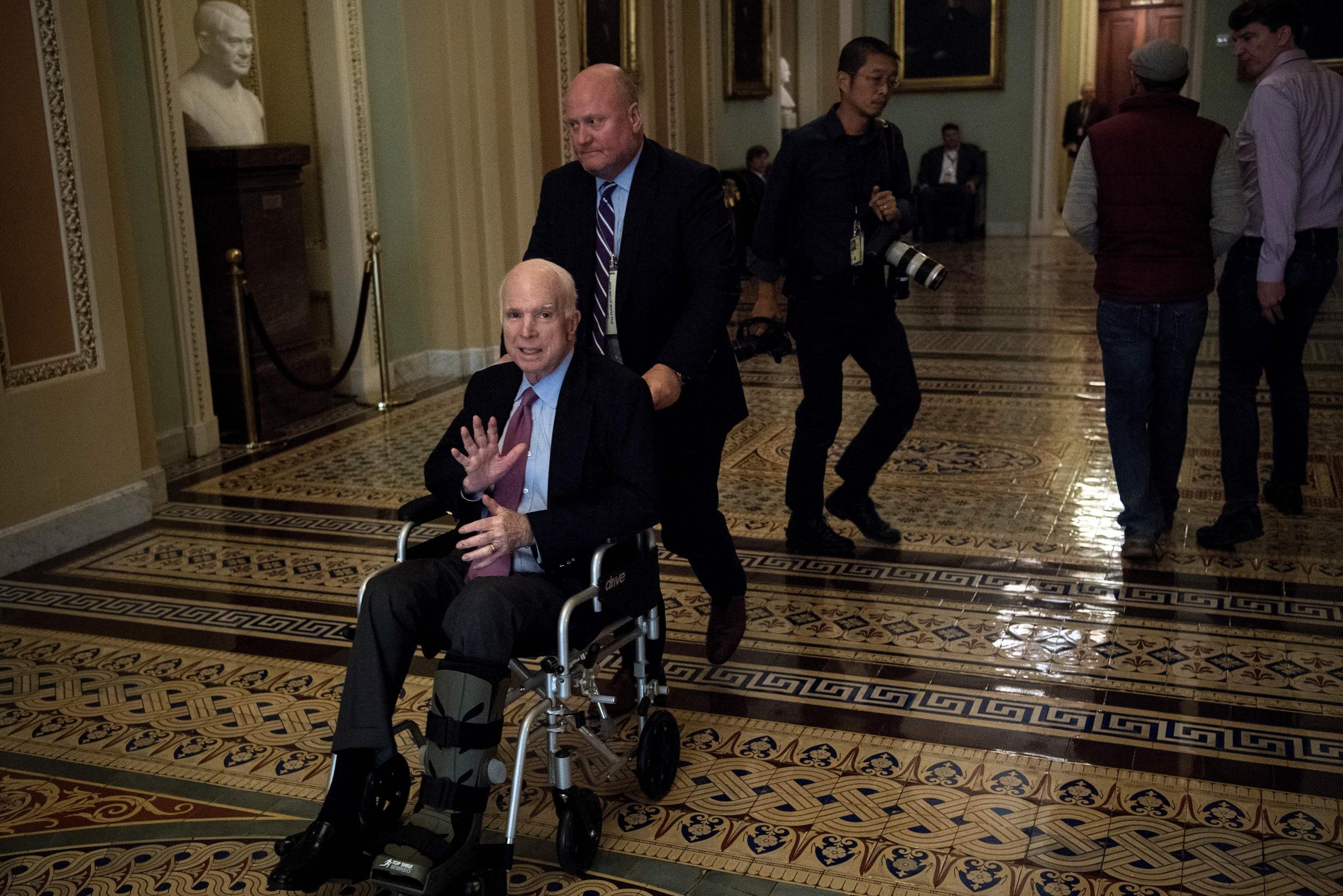Senator John McCain uses a wheelchair on Capitol Hill