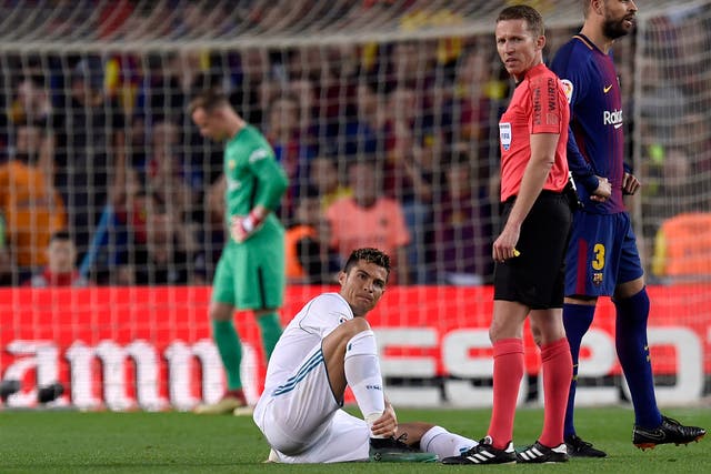 Cristiano Ronaldo will undergo tests on an ankle strain suffered in Real Madrid's 2-2 draw with Barcelona