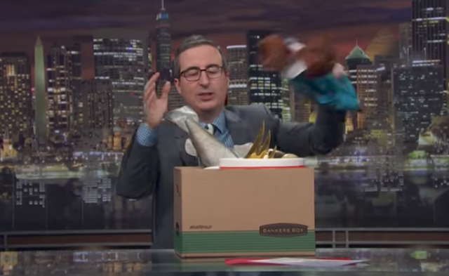 John Oliver packs up his things after 'quitting' Last Week Tonight