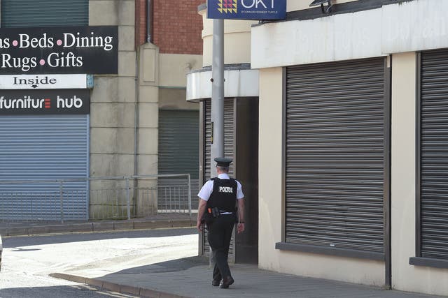 An officer on the scene of the attack in Strabane, Northern Ireland