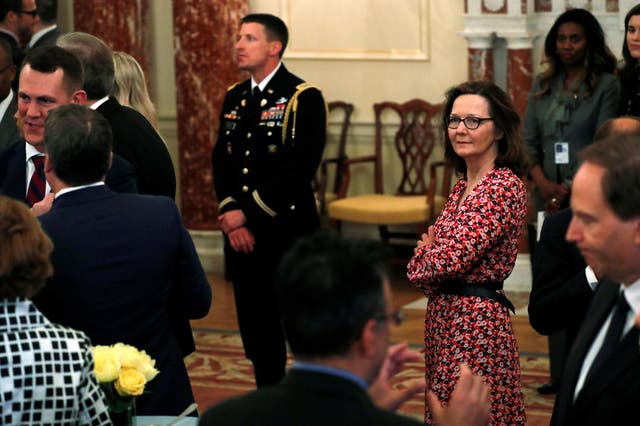 CIA director nominee Gina Haspel (R) attends Secretary of State Mike Pompeo's ceremonial swearing-in at the State Department