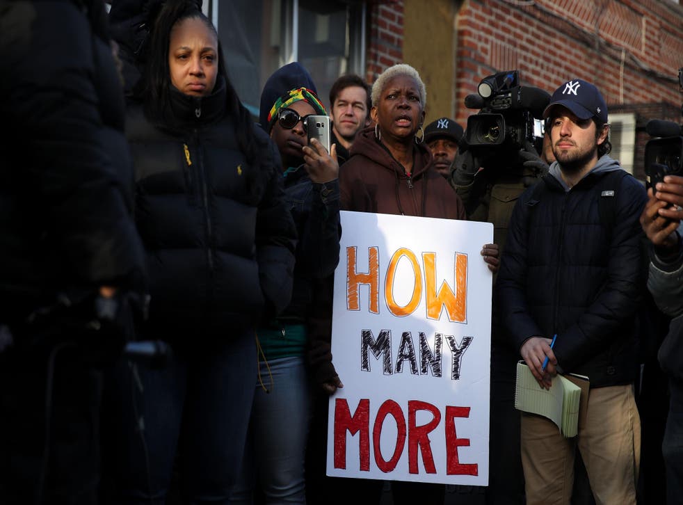 Demonstrators rally in protest of the police-involved shooting death of Saheed Vassell in New York